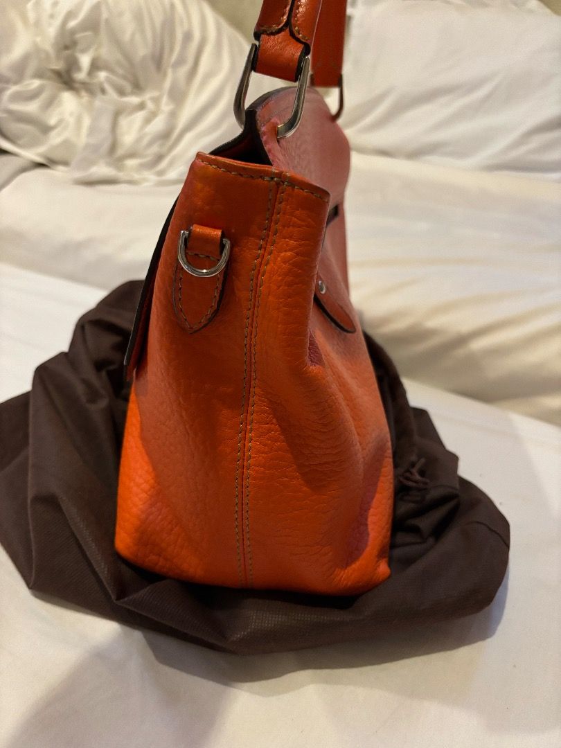 Fino Bag - Regency Iron Orange (Category: Luxury Bags & Wallets) located in Pasay City. Submitted by paulopecson (Listing ID 1326408651, Image 2). Description: 100% Authentic Fino Bag RFS: My mother has too many bags. Used only twice or thrice Little to no scratches Receipt included Inclusive of: Dustbag.