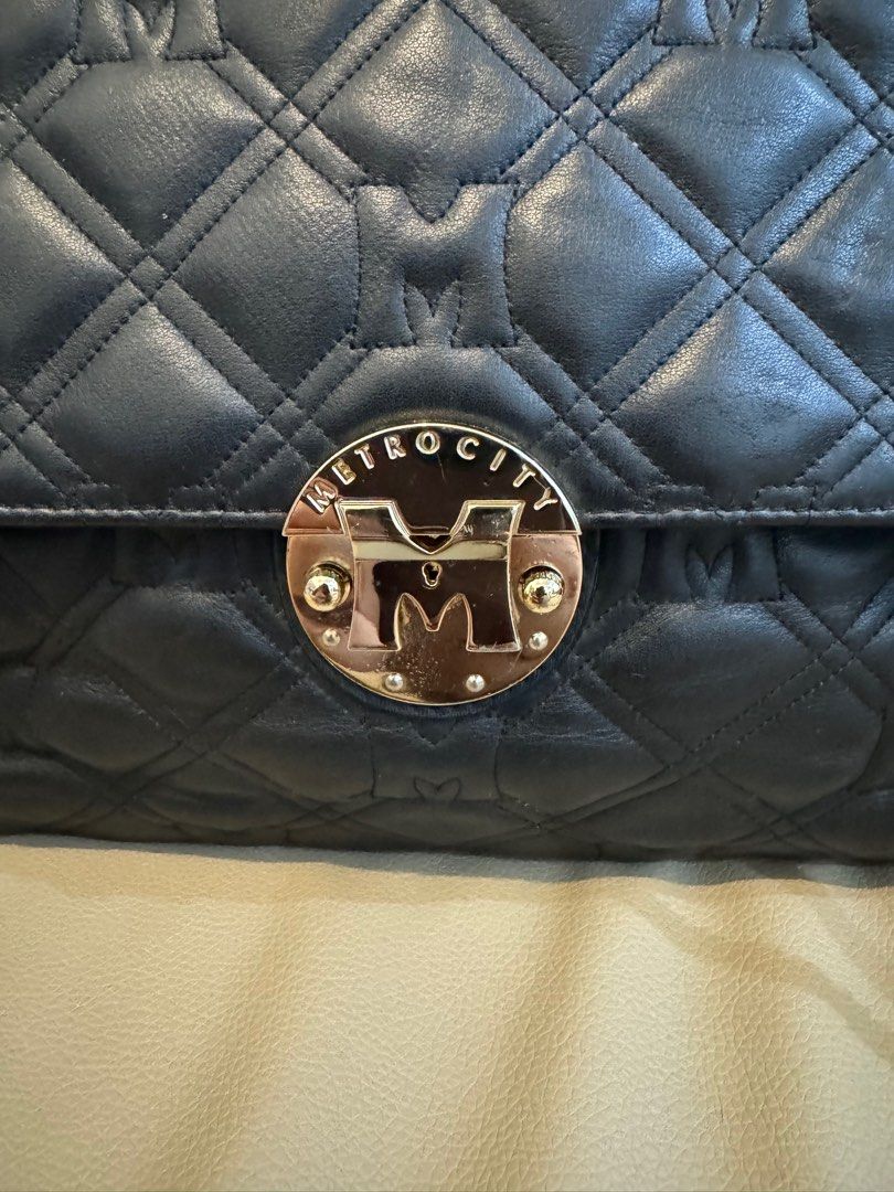 Metro City Double Flap (Category: Luxury Bags & Wallets) located in Angono. Submitted by rainnefer15849 (Listing ID 1326485483, Image 3). Description: Selling my store-bought Metro City chain sling bag with light gold chain. Rarely used, only for special events. Nothing to explain. See last photo for size reference. Still available as long as posted. Last price is posted. MoP: BPI/UB/GCash - Strictly payment first Check out via orange app or same