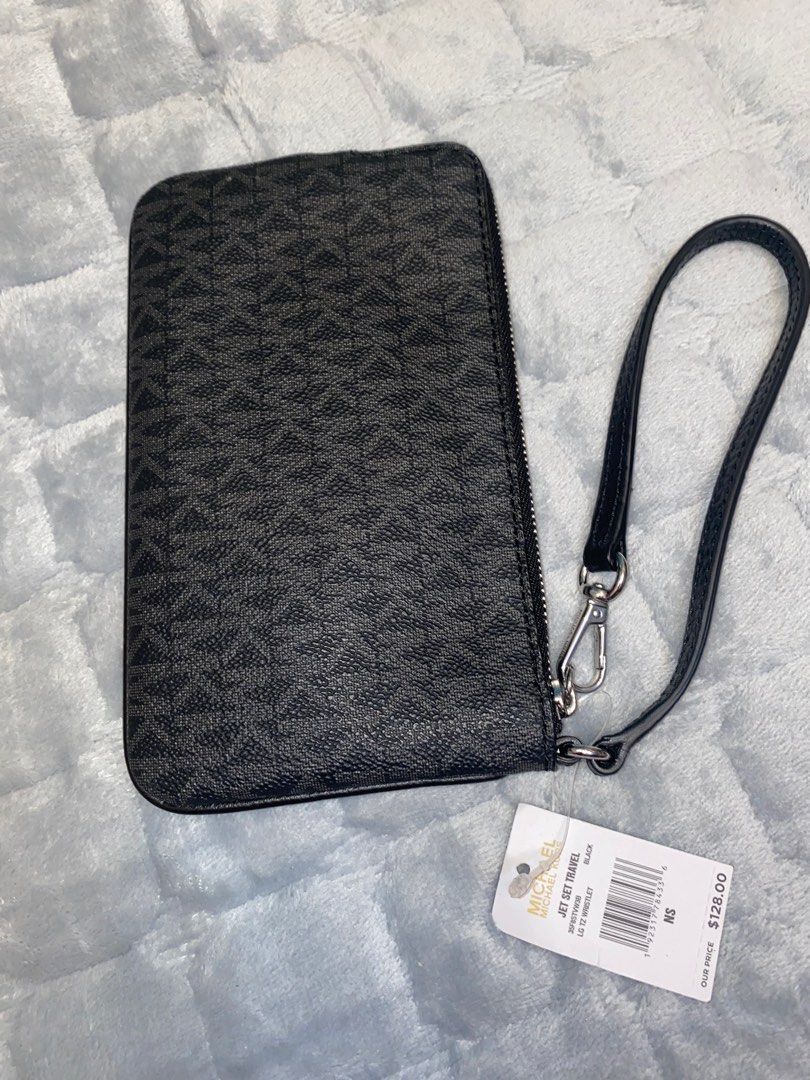 MK Black Wristlet (fits iphone plus phone) (Category: Wallets & Card holders) located in Marikina City. Submitted by neltan_carousel (Listing ID 1326354888, Image 2). Description: 💯% Authentic/Original MK Wristlet • brand new • Inclusions: Care card and price tag only.