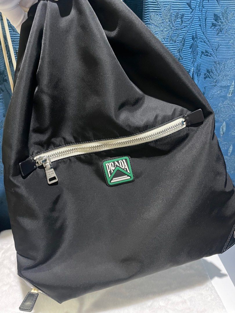 New Authentic Prada 2023 Drawstring Backpack 2VZ030 Mens Womens (Category: Luxury Bags & Wallets) located in Pasig City. Submitted by bestluxurybuys (Listing ID 1326431809, Image 3). Description: New unused condition Authentic Prada 2023 Drawstring Backpack 2VZ030 Mens Womens Dm or Vber O92755II747.