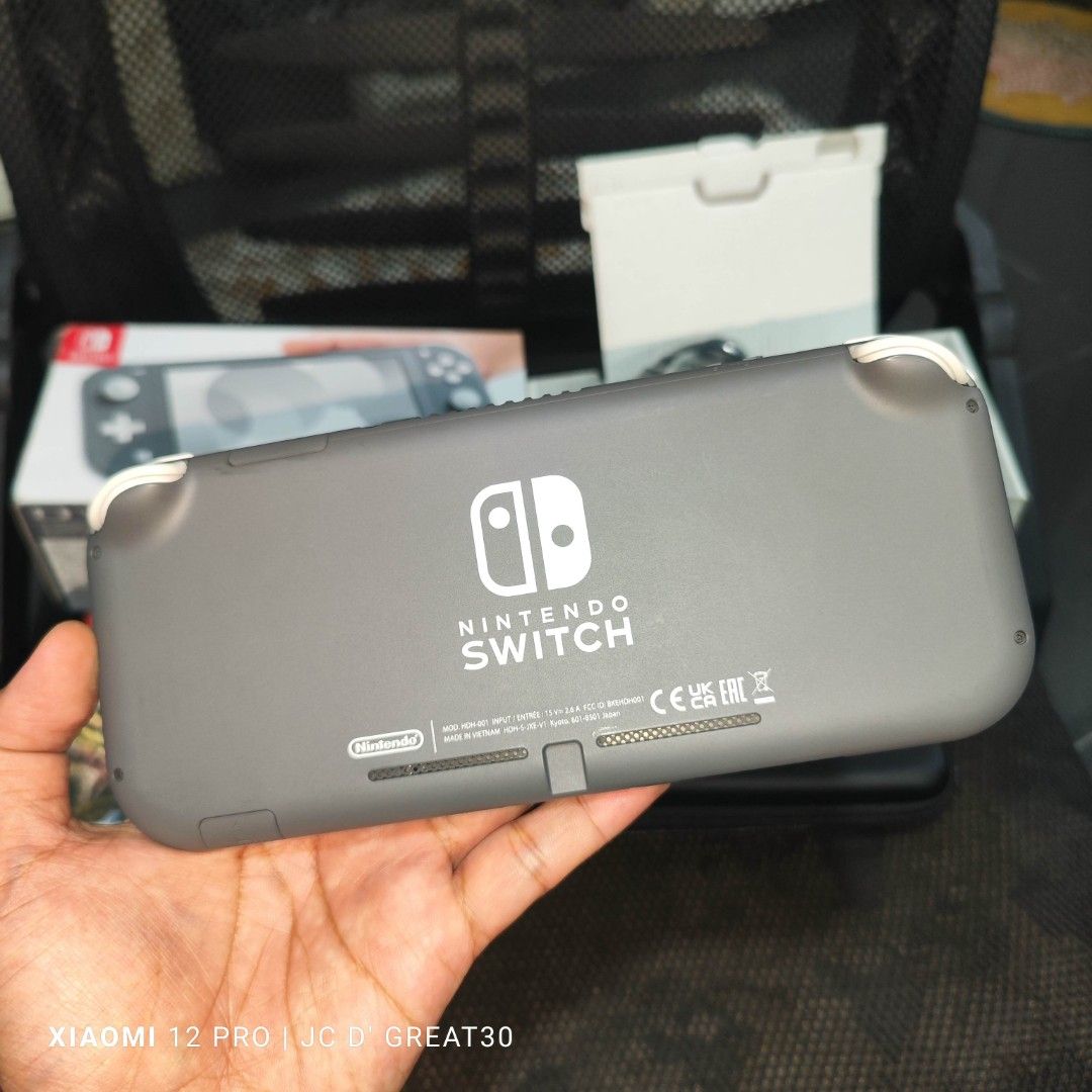 Nintendo Switch lite Gray With Monster Hunter Rise Game Complete, Video