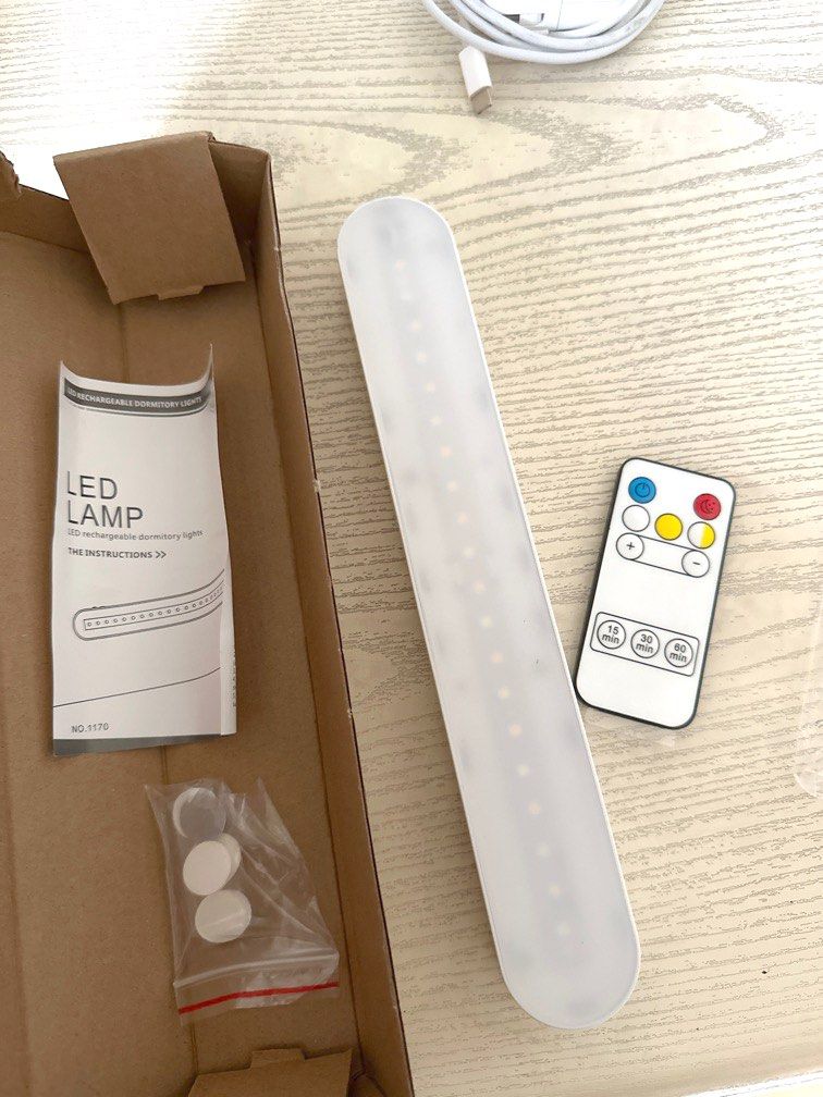 Rechargeable Lamp - 3 Light Settings (Category: Lighting) located in Quezon City. Submitted by shopfinesse (Listing ID 1326366773, Image 1). Description: 3 light settings—cool, warm, and mix Wall-mountable Touch to dim light Great condition! Comes with a remote controller, manual guide, and stickies.