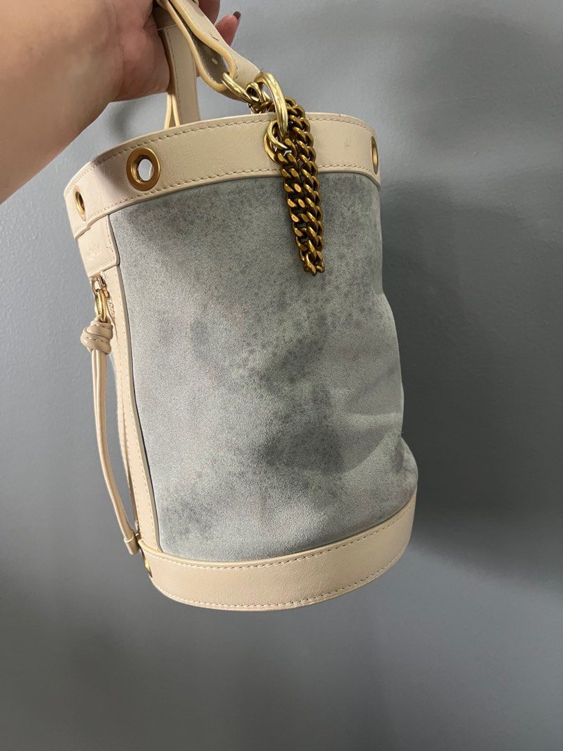 See by Chloe Bucket bag (Category: Luxury Bags & Wallets) located in Quezon City. Submitted by lesgosago (Listing ID 1326444801, Image 3). Description: 💯 Authentic See by Chloe bucket bag In rare baby blue and white Has tags and code plus an intact holo. Inside is very clean. Bag only, as is. Issues: has water(?) marks and small penmarks, needs bag spa. MOP: Gcash/BPI MOD: sdd/lbc.