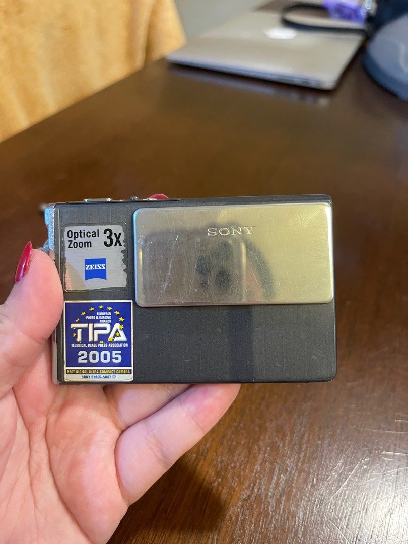 SONY DSC-T7 Digital Camera (Category: Cameras) located in Manila. Submitted by kori.kollects (Listing ID 1326431107, Image 2). Description: SONY DSC-T7 Digital Camera DM for sample shots, working video, and more pics -5.1 megapixels -Good external condition -Vintage output Issues: -Zoom out and in toggle is not working -May screen burn/discoloration (doesn't affect output) Inclusions: -Original battery, original charger, strap Loc. Makati Meetup 
