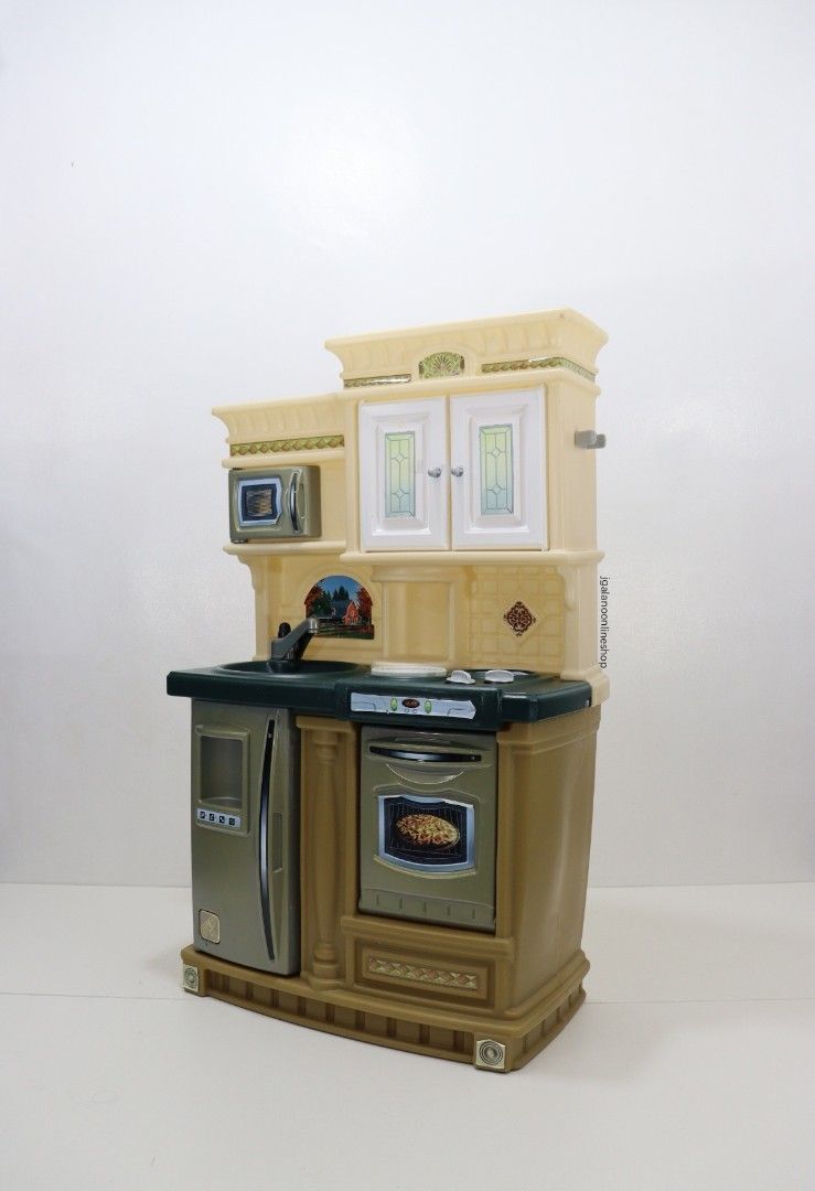 Step 2 Toy Kitchen same Little Tikes Kitchen Play (Category: Kids Toys) located in Valenzuela. Submitted by jgalano1 (Listing ID 1326426918, Image 3). Description: Toys Brand: Step 2 Lifestyle New Traditions Kitchen Condition: Used from Korea, in good condition. Age Recommendation: 3 years old and up. Features: - Working burner electronic frying and boiling sounds - Stainless steel look microwave, refrigerator and oven Flaws/Issues: Few scratches