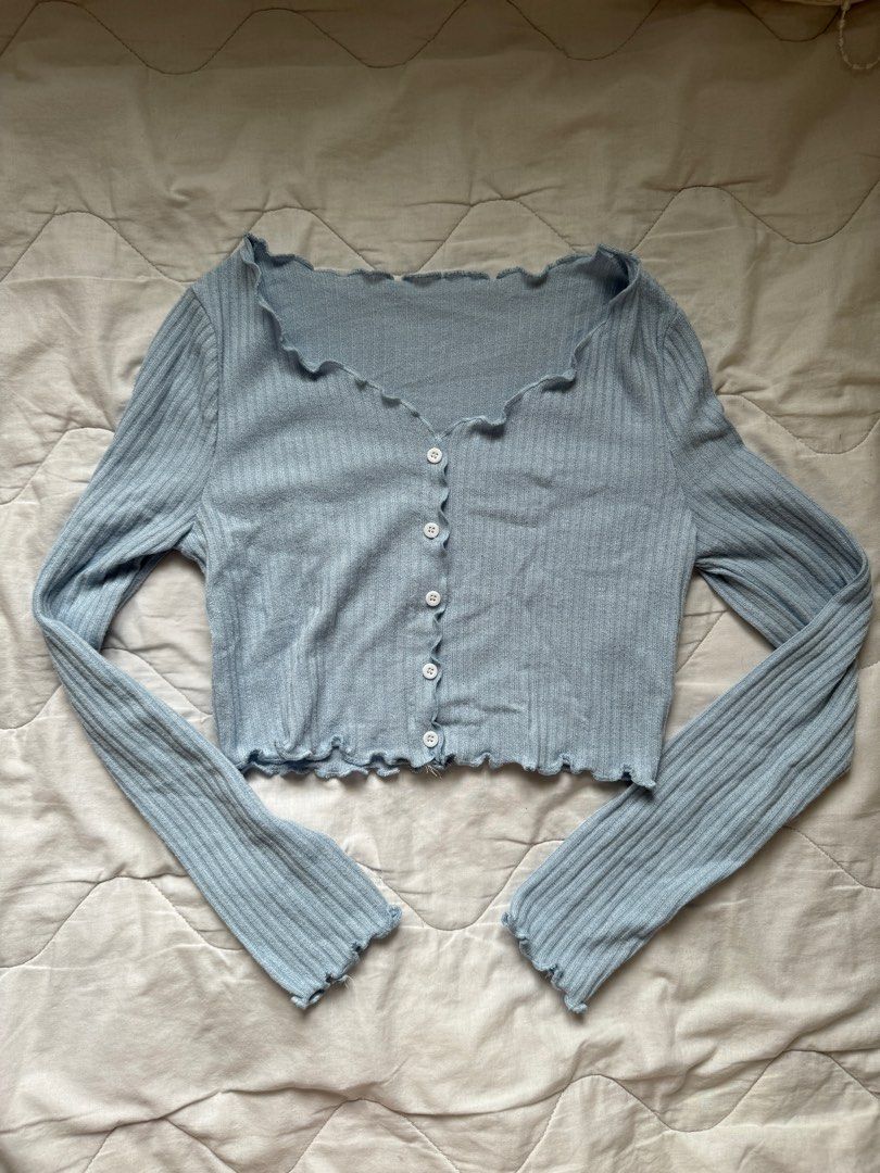 Baby Blue Cropped Cardigan (Category: Longsleeves) located in Imus. Submitted by keyluhhh (Listing ID 1323322415, Image 1). Description: Bought in the States Slightly above the belly button, cute fit! Rfs: not my style anymore MOP: gcash/maya/BPI MOD: gogoxpress/lalamove/grab/angkas Helping tags: shein, zara, cider, forever 21, h&m, hm, bershka, uniqlo, GU, don quijote, pacsun, bench, penshoppe, kamiseta, kashieca, plains and prints, bayo, human,