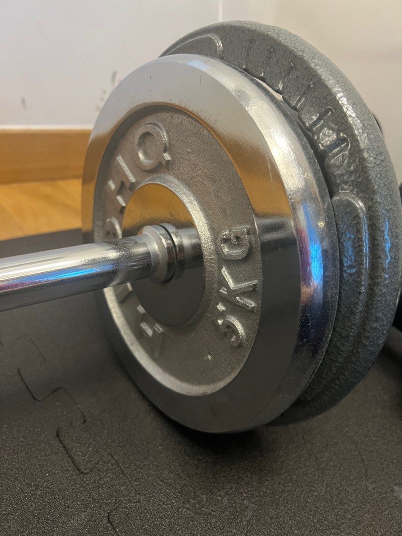 Bar bell (Category: Weights & Dumbbells) located in Singapore. Submitted by milimile (Listing ID 1323377607, Image 2). Description: Bar bell-4.3kg Comes together with 5kg weights * 4 Total 24.3kg.