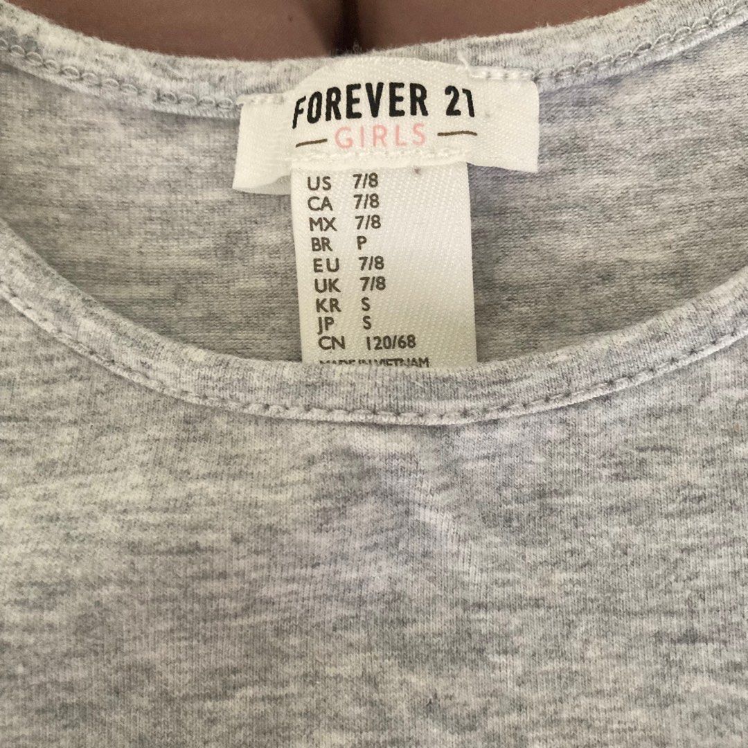 Forever 21 Marl Gray Tank Top (Category: Sleeveless) located in Marikina City. Submitted by mlffy (Listing ID 1318940715, Image 2). Description: 🩶 Authentic Forever 21 Marl Gray Basic Tank Top 🏷️ XS-S 🤍 Cool fabric when worn, seamless quality and fitting! 👛 GCash.