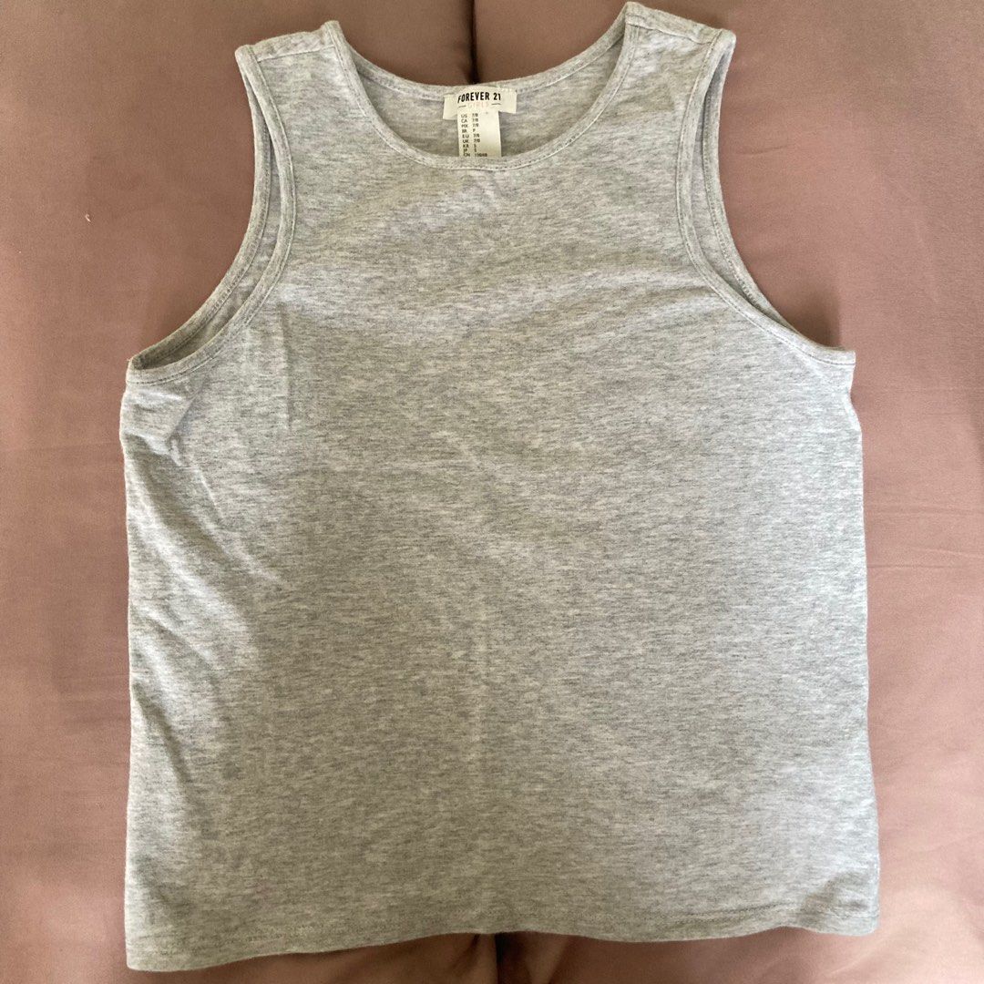 Forever 21 Marl Gray Tank Top (Category: Sleeveless) located in Marikina City. Submitted by mlffy (Listing ID 1318940715, Image 1). Description: 🩶 Authentic Forever 21 Marl Gray Basic Tank Top 🏷️ XS-S 🤍 Cool fabric when worn, seamless quality and fitting! 👛 GCash.