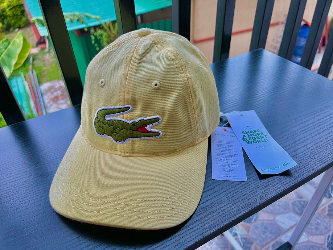 Yellow lacoste cap on sale