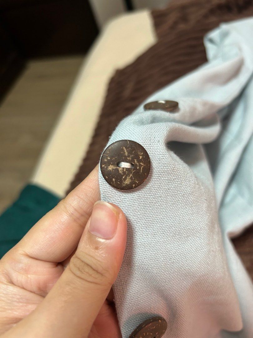 Maxi Linen Vest Light Blue (Category: Sleeveless) located in Quezon City. Submitted by kn.declutters (Listing ID 1323443469, Image 3). Description: Good as new Stitched the buttons to reinforce yung kapit No when worn photo, kindly browse their IG page na lang :).