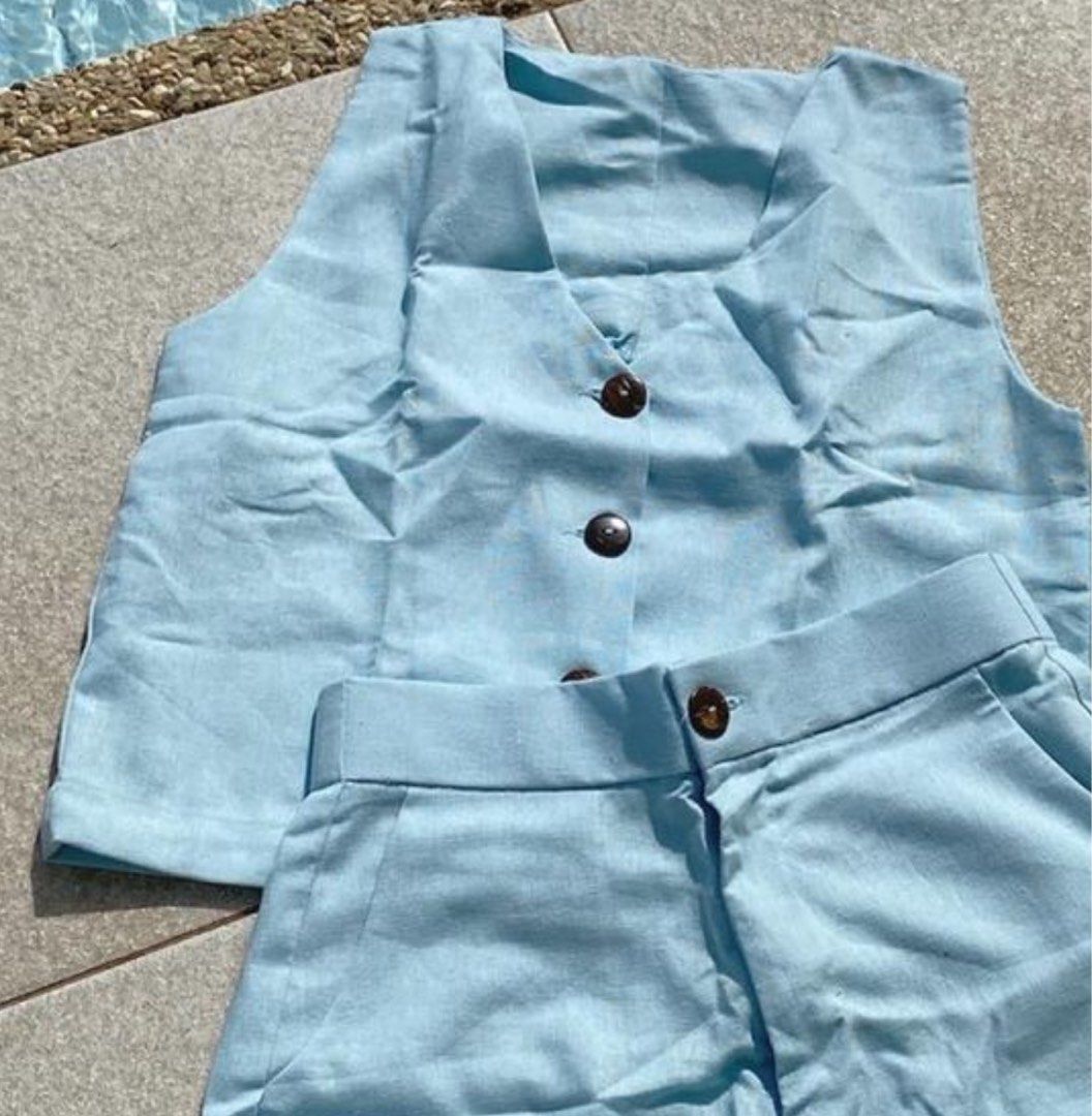 Maxi Linen Vest Light Blue (Category: Sleeveless) located in Quezon City. Submitted by kn.declutters (Listing ID 1323443469, Image 1). Description: Good as new Stitched the buttons to reinforce yung kapit No when worn photo, kindly browse their IG page na lang :).