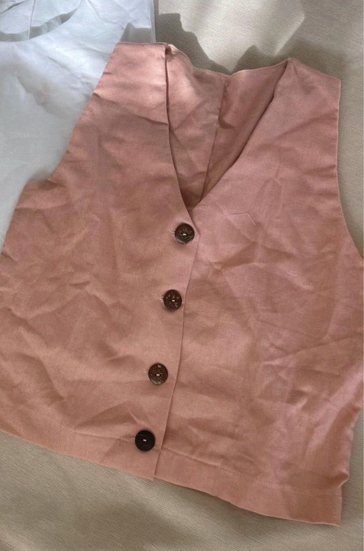 Maxi Linen Vest Top Pink (Category: Sleeveless) located in Quezon City. Submitted by kn.declutters (Listing ID 1323443381, Image 2). Description: Good as new Stitched the buttons to reinforce yung kapit No when worn photo, kindly browse their IG page na lang :).