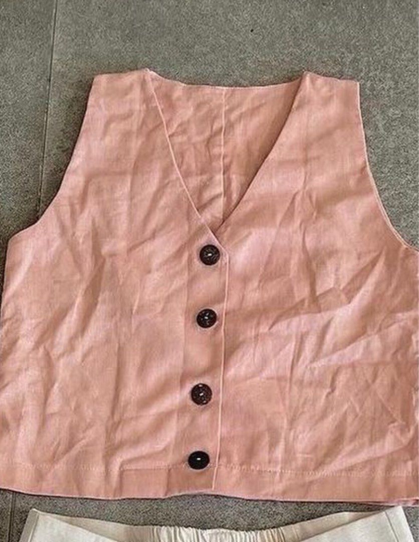 Maxi Linen Vest Top Pink (Category: Sleeveless) located in Quezon City. Submitted by kn.declutters (Listing ID 1323443381, Image 1). Description: Good as new Stitched the buttons to reinforce yung kapit No when worn photo, kindly browse their IG page na lang :).