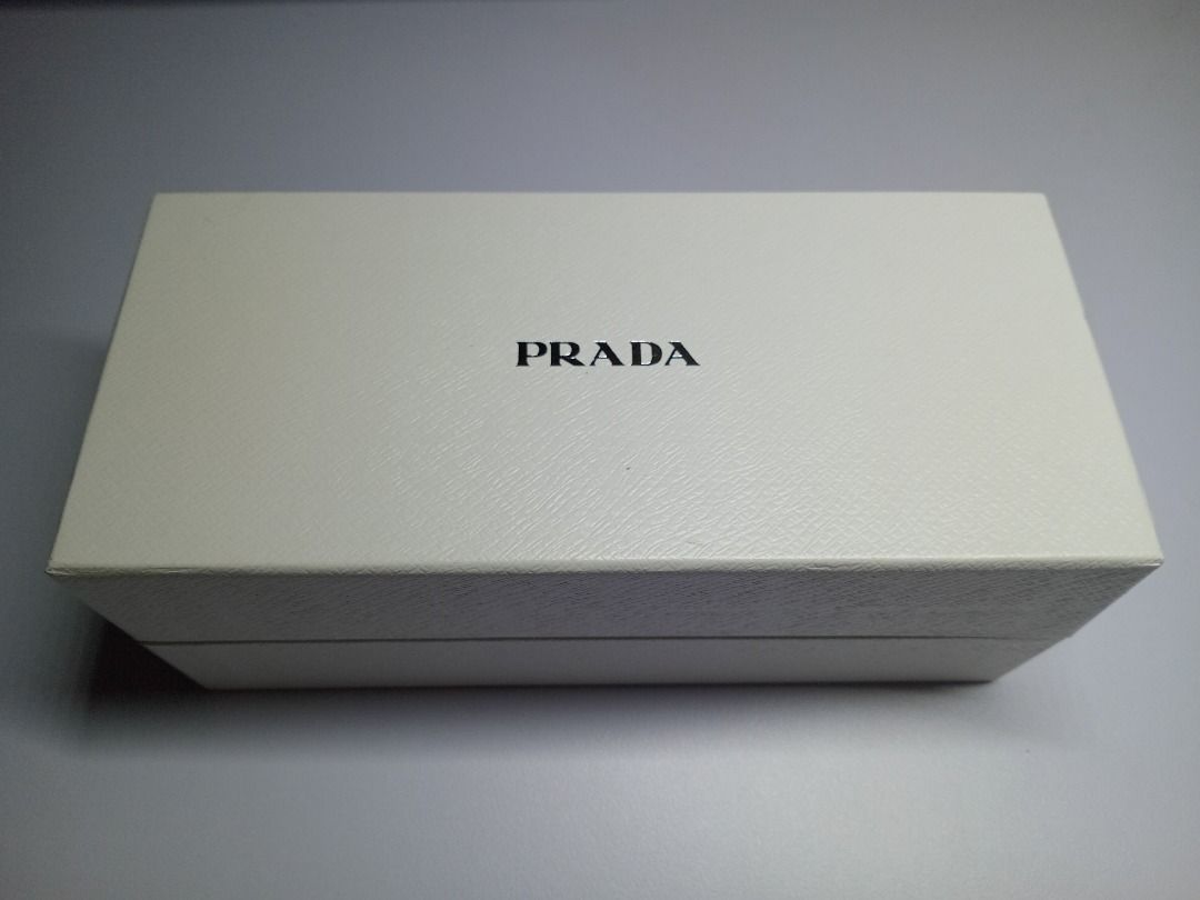 Prada Blue & Black Sunglasses (Category: Sunglasses & Eyewear) located in Manila. Submitted by kyloooe (Listing ID 1323290183, Image 2). Description: Not entirely sure what kind this was as my Mom got it quite some time ago. It doesn't fit her anymore so we're looking to pass it on to the next person :).