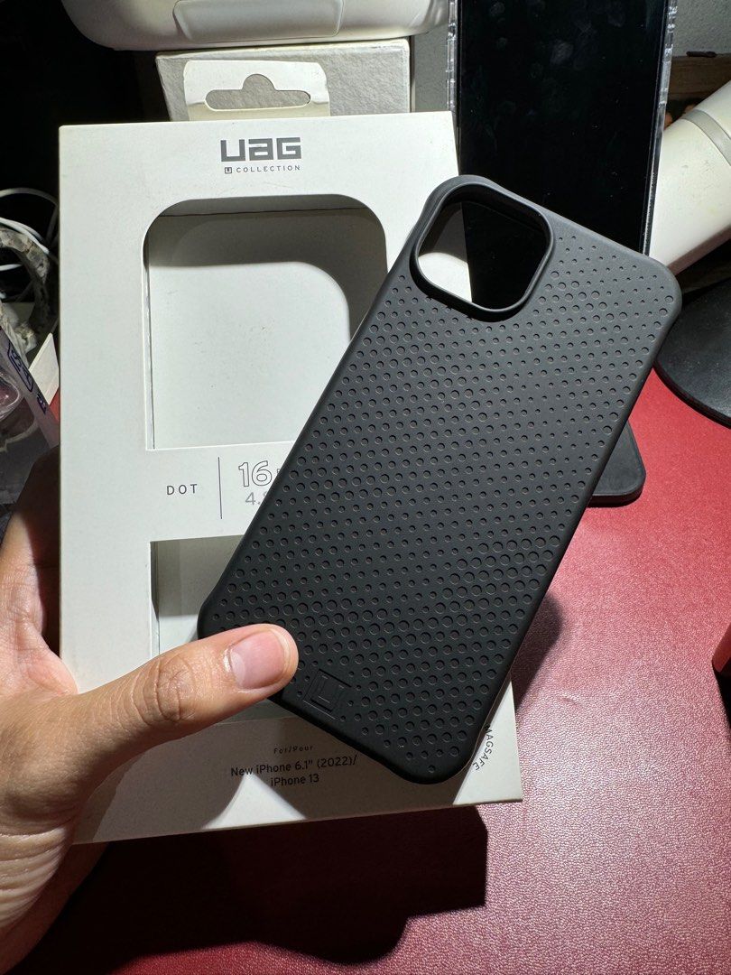 UAG Dot Magsafe Case for iPhone 14/13 (Category: Cases & Sleeves) located in Quezon City. Submitted by violet_08 (Listing ID 1323363215, Image 1). Description: For sale only Brandnew UAG Dot Magsafe Case Compatible with iPhone 14 and iPhone 13 Black 10/10 condition Not used No issues Orig price is 3890.