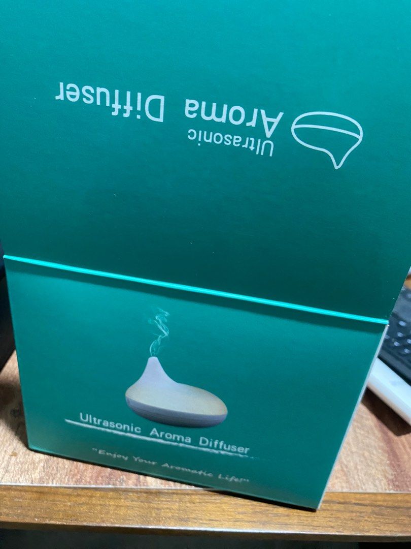 Ultrasonic Diffuser (Category: Other Home Appliances) located in Singapore. Submitted by shirl38 (Listing ID 1323443443, Image 1). Description: Brand New Diffuser with USB charger.