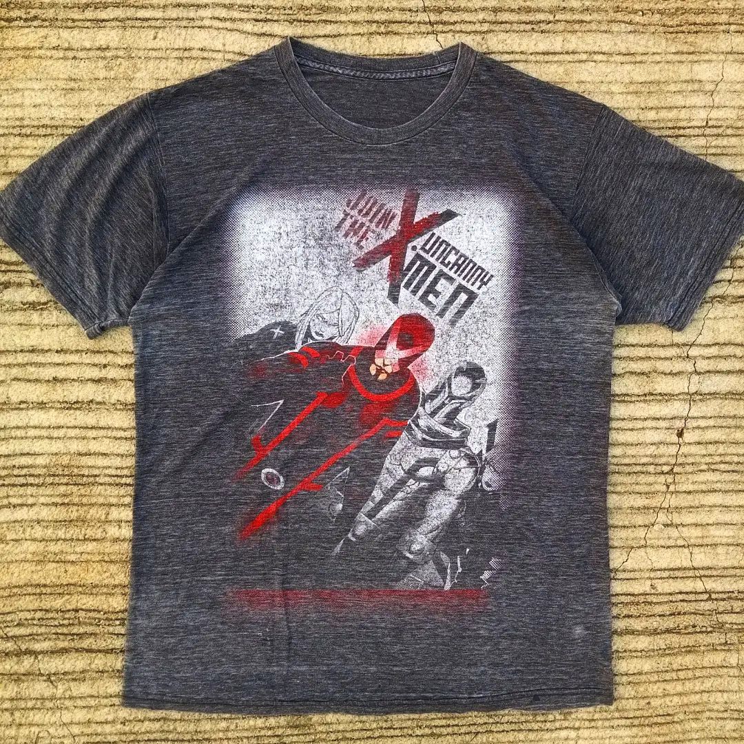 Uncanny X-Men Shirt by Mad Engine (Category: Tshirts & Polo Shirts ) located in Dasmarinas. Submitted by vintagesoulph (Listing ID 1323317929, Image 1). Description: Uncanny X-Men Shirt by Mad Engine • Size Large (28.5 x 22) • Missing Mad Engine tag • Good vintage fade detail • Comfy wearable texture PRICE: 800 PHP + shipping fee ✅.