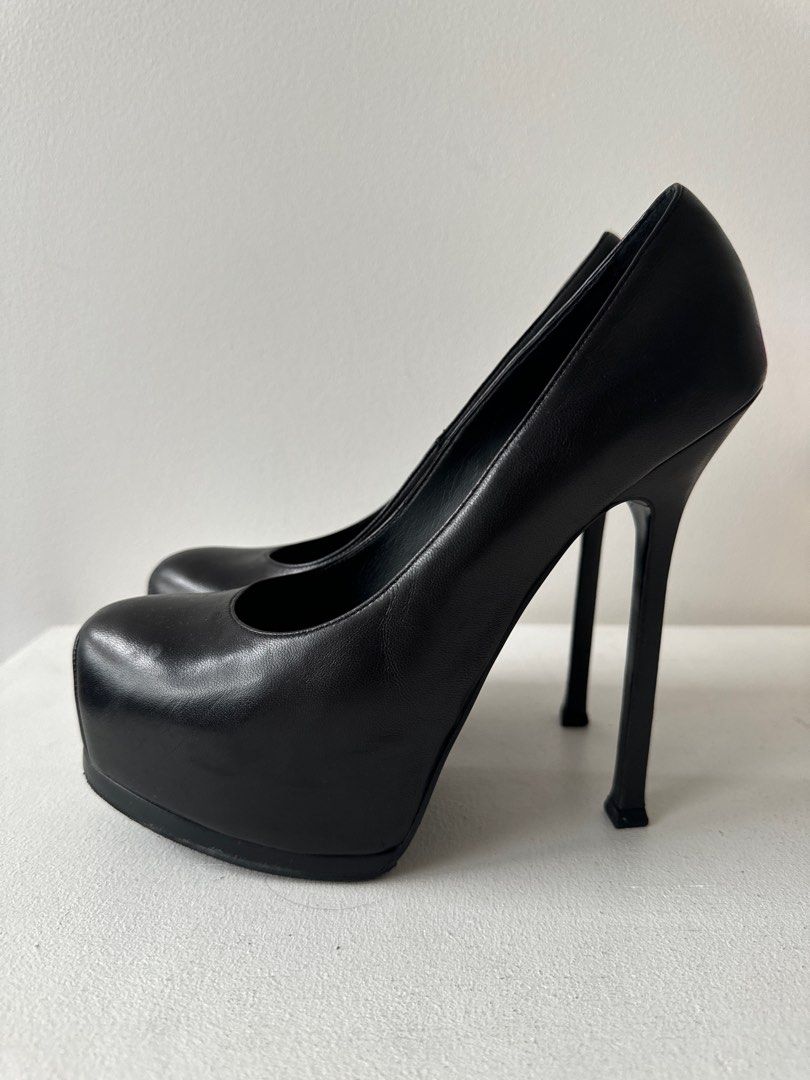 YSL Trib Too Pumps (Category: Heels) located in Makati City. Submitted by theladyluxxe (Listing ID 1323355451, Image 3). Description: Size 38 These perfect black leather pumps come with super high heels and platforms, to make a real style statement. Heel height: 10.5 cm.Heel height from ground: 14.5cm.Platform: 4cm. Excellent condition (9.5/10) Comes with dust bag .