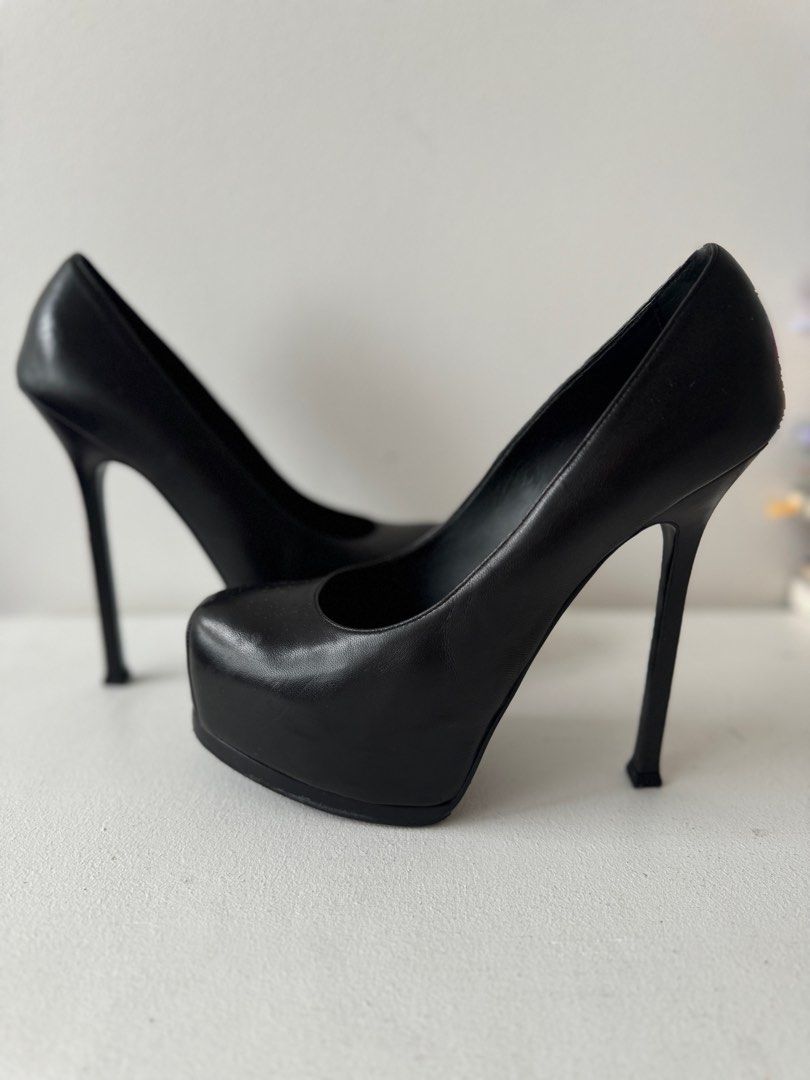 YSL Trib Too Pumps (Category: Heels) located in Makati City. Submitted by theladyluxxe (Listing ID 1323355451, Image 2). Description: Size 38 These perfect black leather pumps come with super high heels and platforms, to make a real style statement. Heel height: 10.5 cm.Heel height from ground: 14.5cm.Platform: 4cm. Excellent condition (9.5/10) Comes with dust bag .