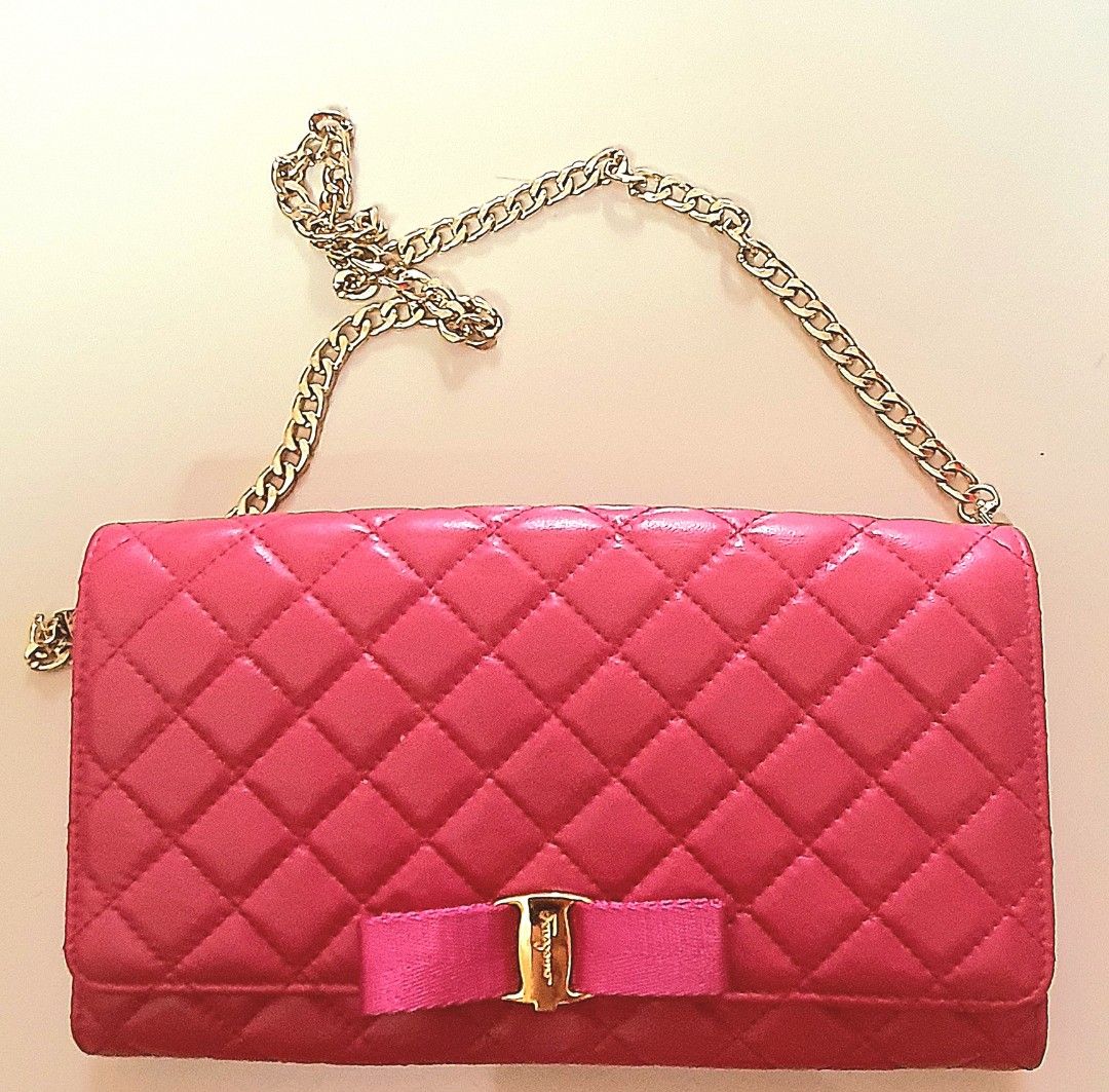 Ferra sling bag (Category: Luxury Bags & Wallets) located in Baguio. Submitted by callwan24792 (Listing ID 1326626559, Image 1). Description: Chic Quilted Handbag with Bow Accent Step out in style with this gorgeous pink quilted handbag featuring an elegant bow detail. The bag's luxurious quilted design, combined with its vibrant pink color, exudes femininity and sophistication. A gold-tone metal bow charm on the front adds a touch of glam, while