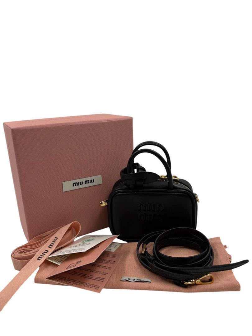 ⚜️Miu Miu - bag charm (Category: Luxury Bags & Wallets) located in Makati City. Submitted by 90sangel (Listing ID 1326583937, Image 2). Description: •Item: Miu Miu black nbag charm 🖤 •Size: Micro bag •Condition: Brand New condition Giftable, lowest price! made in italy, crafted with soft leather. 🖤🤎 w/ detachable strap can be worn as crossbody. *100% 𝒂𝒖𝒕𝒉𝒆𝒏𝒕𝒊𝒄, 𝒆𝒙𝒑𝒆𝒓𝒕𝒍𝒚-𝒗𝒆𝒕𝒕𝒆𝒅..