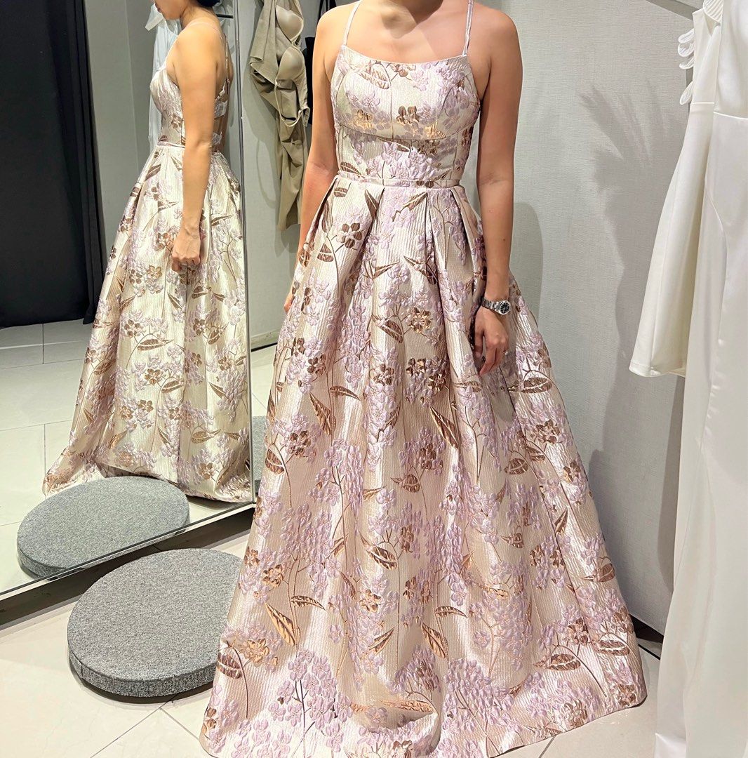 Pink textured gown by Morgan & Co (Category: Evening dresses & gowns) located in Quezon City. Submitted by choomichob (Listing ID 1326623536, Image 1). Description: Sturdy woven jacquard, with a floral pattern throughout, shapes adjustable criss-cross straps, and a bustier-style bodice with a square neckline. Center back zipper/clasp. For rent / sale Dress is from Morgan and Co (US brand) Bought this for 11k++ Adjustable straps, size XS-S Rental:
