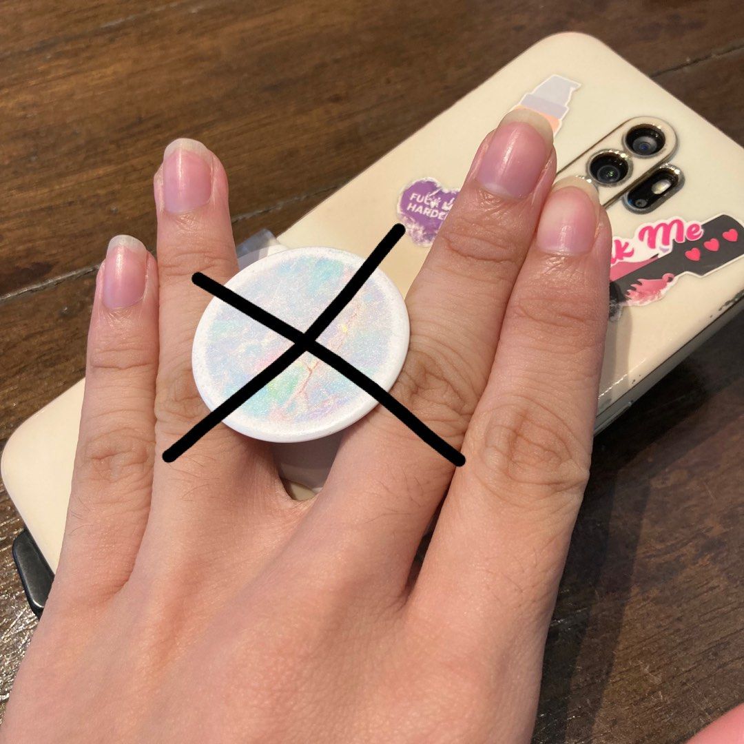 PopSockets Slide Stretch PopGrip Opal white (Category: Cases & Sleeves) located in Taguig. Submitted by grindrr (Listing ID 1309925331, Image 2). Description: Unit lang. phone and phone case not included EDIT: NO MORE POP TOP. Too lazy to edit photos RFS: no longer needed Original popsocket Issues: May butas na Ang gilid ng pop top Not as tight na Ang grip compared to when it was new, pero it’s still holding well pa naman Used on my Oppo A9 (2020