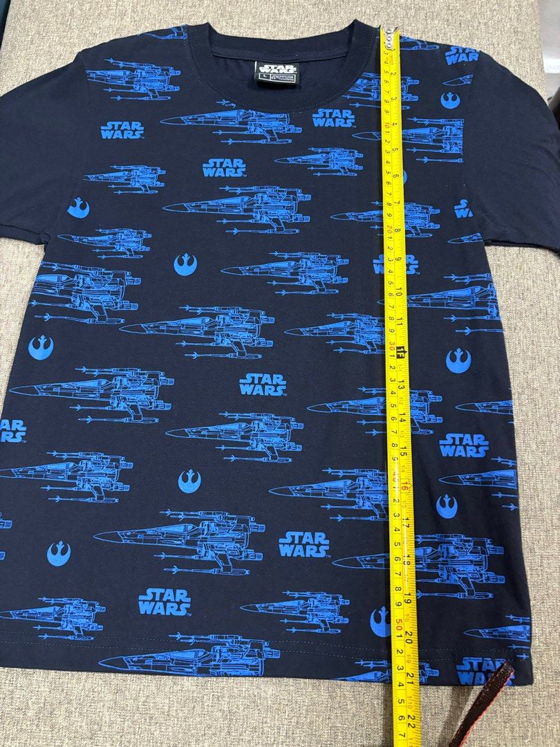 Star Wars Shirt for kids (Category: Babies & Kids Fashion) located in Pasay City. Submitted by loved_items211 (Listing ID 1326647419, Image 2). Description: Star Wars shirt bought from department store. Good condition, no issues. Used only once. Please check the photos for details and exact measurements..