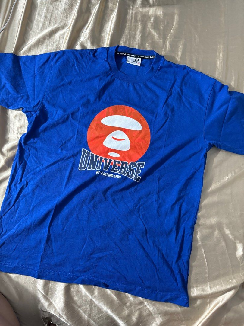 AAPE by BAPE Moonface Print Boxy Fit (Category: Tshirts & Polo Shirts ) located in Manila. Submitted by escobear (Listing ID 1326770884, Image 1). Description: Never been used, sinukat lang. Excellent Print RFS: Not my style.