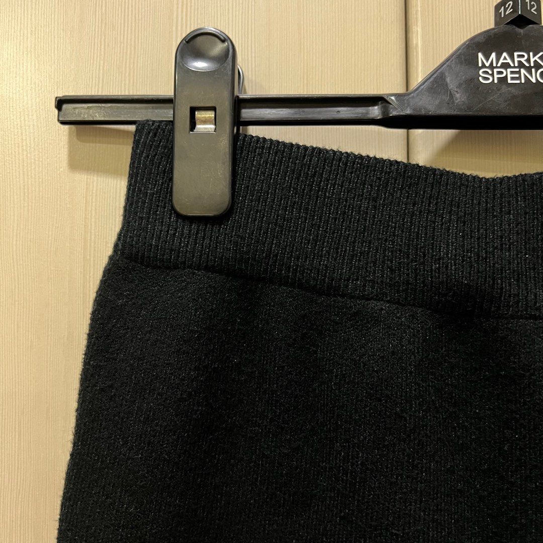 black knit skirt (Category: Skirts) located in Manila. Submitted by basicbaguette (Listing ID 1326749927, Image 2). Description: fits small to medium thick knit material bought this in korea.