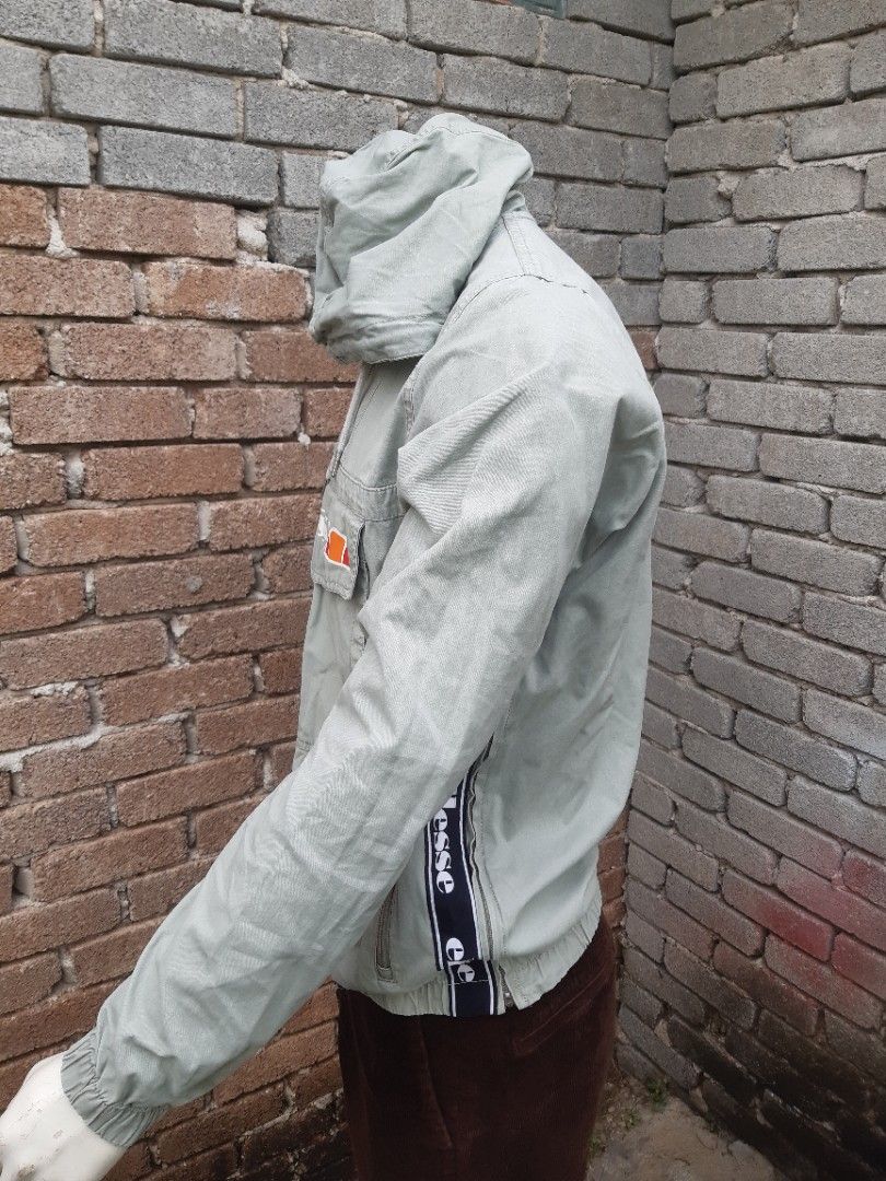 ELLESSE HALF ZIPPER ANORAK SIDE TAPE GREY COLUOR Men s Fashion Coats Jackets and Outerwear on Carousell