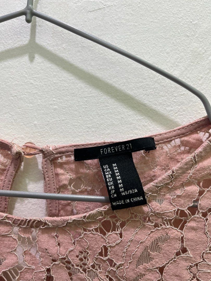 Forever 21 Pink Lace Top (Category: Blouses) located in Imus. Submitted by declutterbycad (Listing ID 1326842302, Image 2). Description: Crop top S-Med Mop:Gcash/Maya.