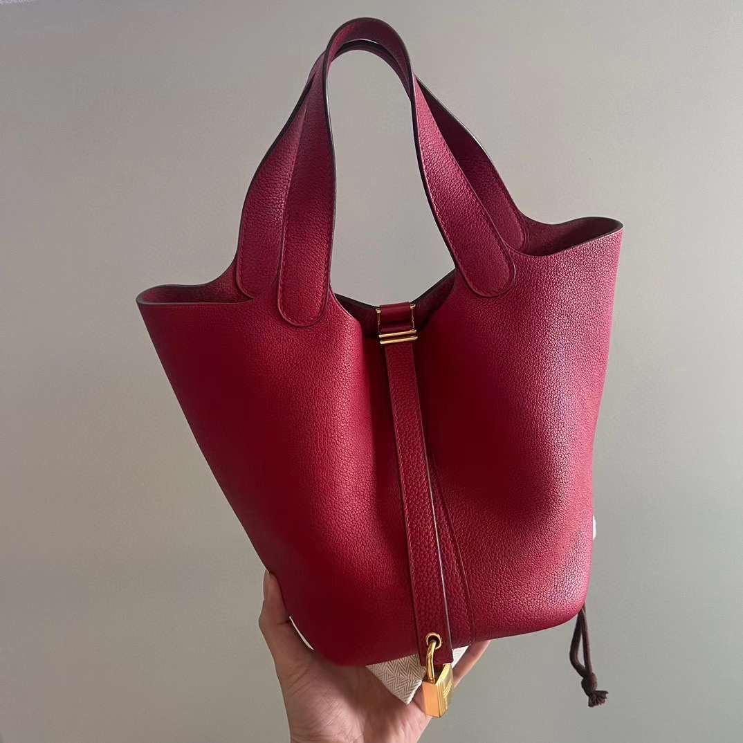Hermes Picotin 18 (Category: Luxury Bags & Wallets) located in Taguig. Submitted by jbrigancia (Listing ID 1326841096, Image 1). Description: Hermès Picotin 18 K1 Rogue Grenat Stamp D EXCELLENT Bag structure Mint Condition 9.8/10 With lock and keys 💯Guaranteed Authenticity.
