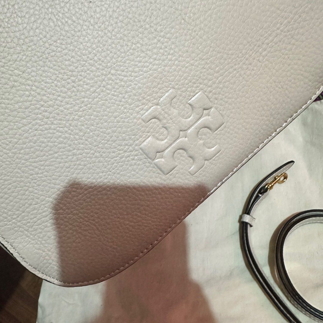 Tory Burch Thea Small Bucket Bag (Category: Luxury Bags & Wallets) located in San Fernando. Submitted by chweez (Listing ID 1326728720, Image 3). Description: Authentic Tory Burch Thea Small Bucket Bag Bought brand new & never used With dust bag, no box.