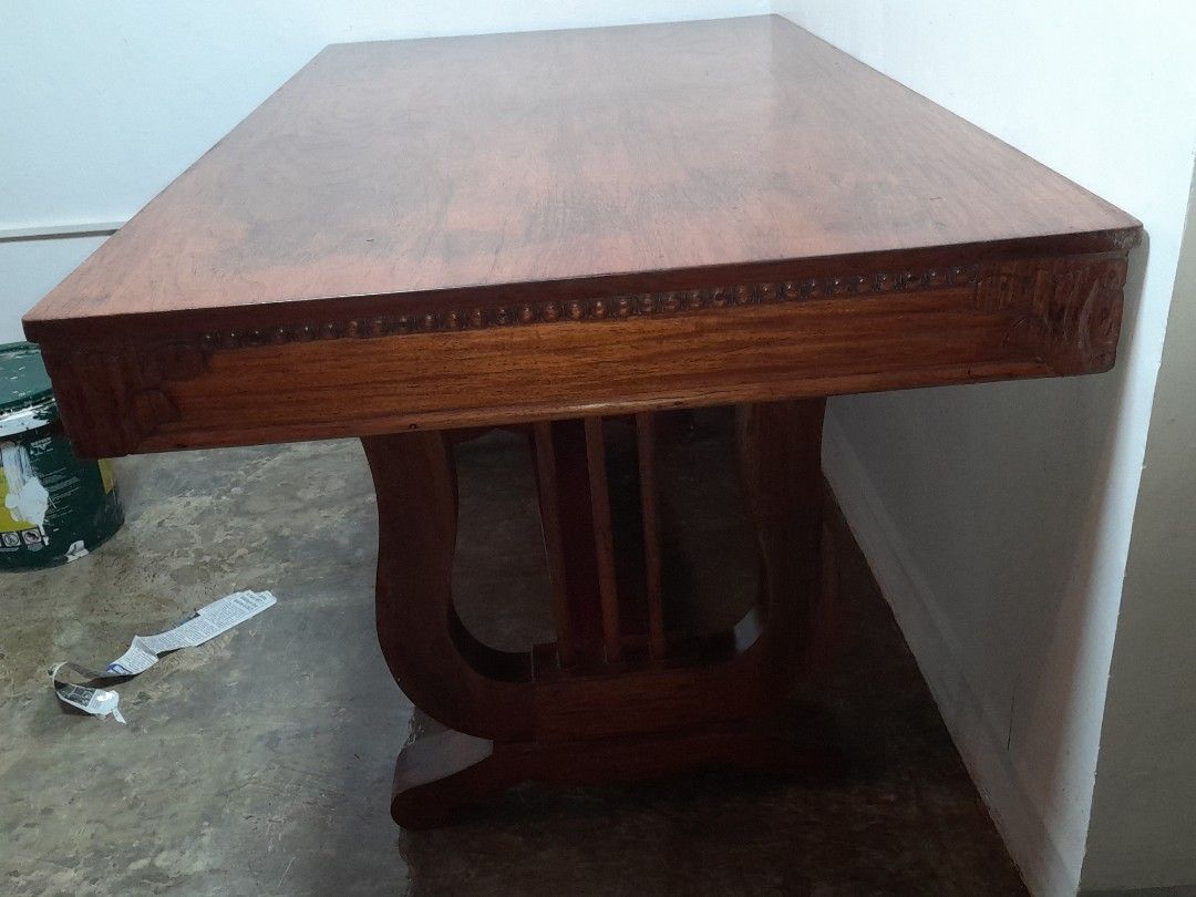 Vintage narra 1 piece top dining table (Category: Tables & Sets) located in Quezon City. Submitted by verybountiful (Listing ID 1326712073, Image 3). Description: Vintage narra dining table with harp legs. Beautiful. Refurbished. Very heavy. Can be disassembled. Dimensions: 3 ft x 5 ft Location: Quezon City. Buyer arranges transport and crew to carry. We have no helpers. MOP RCBC, Landbank or gcash. No long reservations, please..