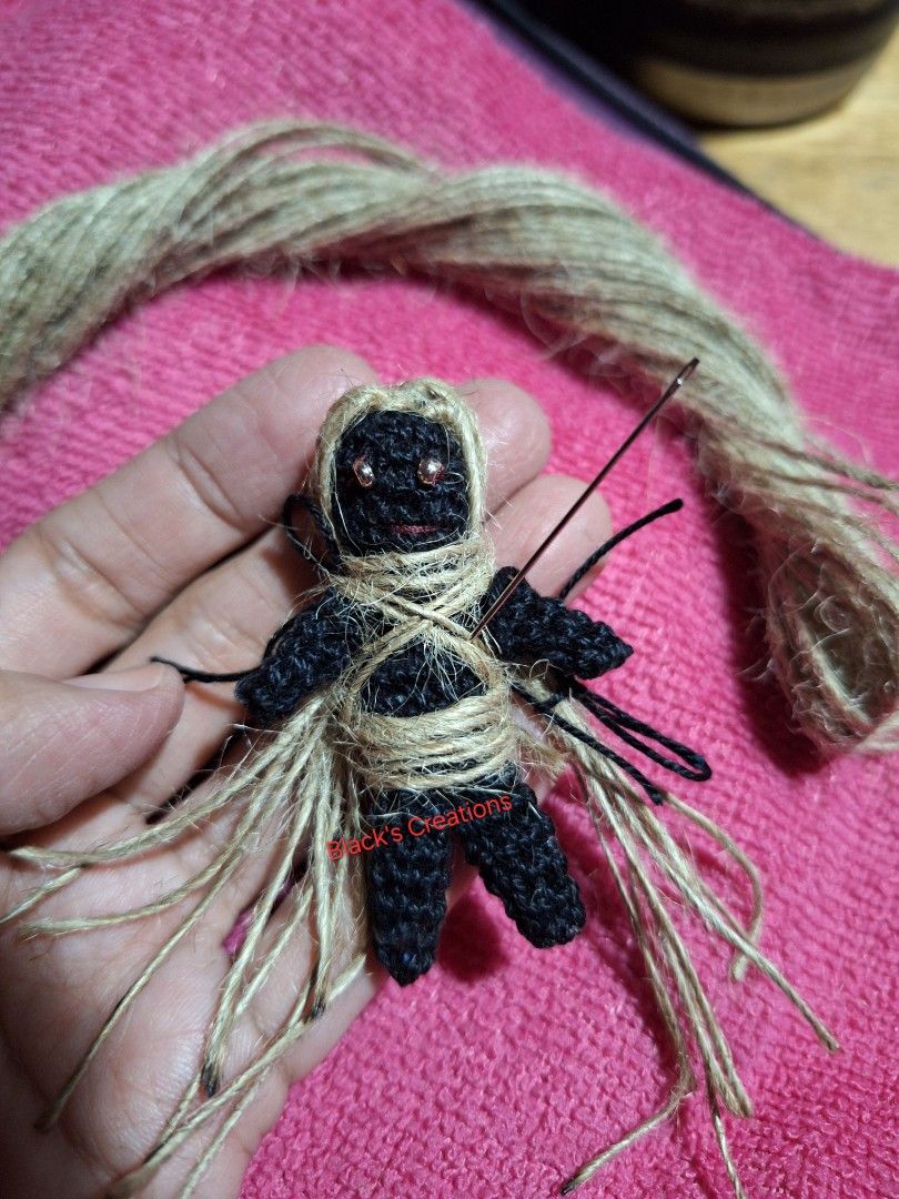 Voodoo Doll Miniature (Category: Handmade Craft) located in Cavite. Submitted by Mavee (Listing ID 1326743683, Image 3). Description: Handmade Miniature Voodoo doll, with natural Jute chord and cotton yarn, metal mini eye beads' By: Black's Creations, only 1 stock per design🤍 proceeds will go to our Senior Grandparents Medical need🙏🖤🖤🖤.