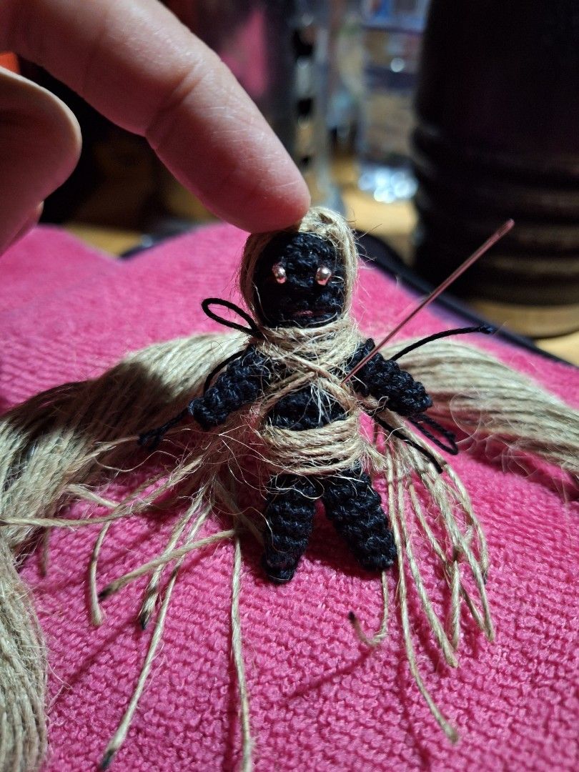 Voodoo Doll Miniature (Category: Handmade Craft) located in Cavite. Submitted by Mavee (Listing ID 1326743683, Image 2). Description: Handmade Miniature Voodoo doll, with natural Jute chord and cotton yarn, metal mini eye beads' By: Black's Creations, only 1 stock per design🤍 proceeds will go to our Senior Grandparents Medical need🙏🖤🖤🖤.