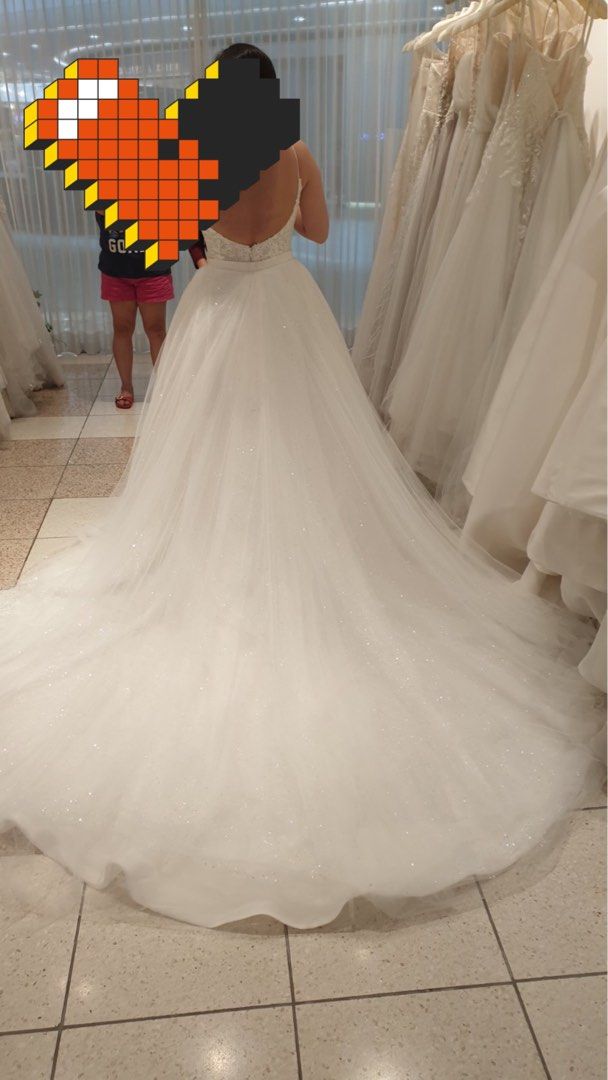 Wedding Overskirt (Detachable) (Category: Skirts) located in Pasig City. Submitted by hellosunnyyy (Listing ID 1326772169, Image 1). Description: Detachable overskirt used for my wedding. Has glitters/shimmer. Worn once but needs to be dry cleaned. I got it custom made from Studi* Ceremönie for 15k. Waist can be adjusted/altered. Dry cleaning and shipping is shouldered by buyer. *ACTUAL WEDDING GOWN NOT INCLUDED Loc: Pasig City.