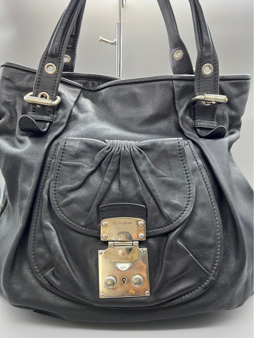 Authentic MiuMiu Vitello Lux leather bag (Category: Luxury Bags & Wallets) located in Cagayan de Oro. Submitted by riggstuffs (Listing ID 1326939075, Image 1). Description: ➡️ Guaranteed Authentic MiuMiu Vitello Lux Leather Tote bag ➡️ Made in Italy ➡️ With code ➡️ Clean exterior with minimal signs of use, Interior is spacious and with 2 compartments ➡️ Dimension: H14” x L 20”. Handle drop is 9” ➡️ No other inclusion Disclaimer: Riggstuffs is not