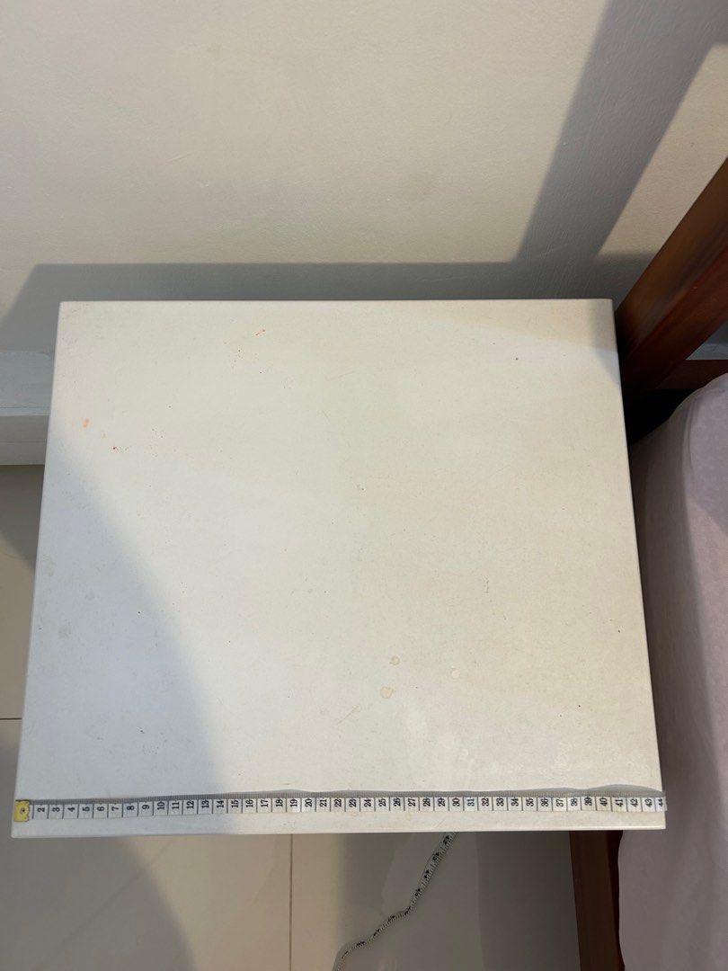 Bedside Table (Category: Shelves, Cabinets & Racks) located in Singapore. Submitted by o_osell (Listing ID 1326922408, Image 2). Description: Letting go of a pair of side tables. Seek buyer’s kind understanding that surface is not pristine white as it is brand new. There are slight visible markings on the surface table. Please arrange for own pick up. .