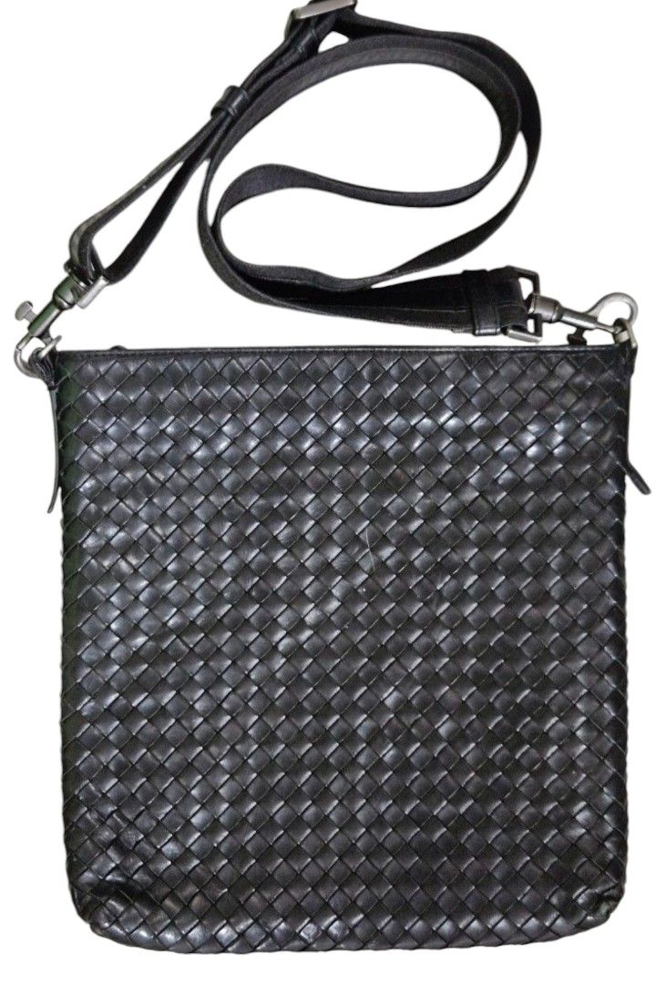 Bottega Veneta sling bag (Category: Luxury Bags & Wallets) located in Las Pinas. Submitted by 05.11minimalist (Listing ID 1320887463, Image 1). Description: Bottega Veneta Intrecciato sling crossbody bag. Black. Made in Italy. Dimensions: 11" x 11". Signed hardware. No missing tags. Zipper opens and closes smoothly. Sling, no cracks leather accent. Clean interior, no foul odor. No rips, runs or holes interior and exterior of bag. Very small rub o