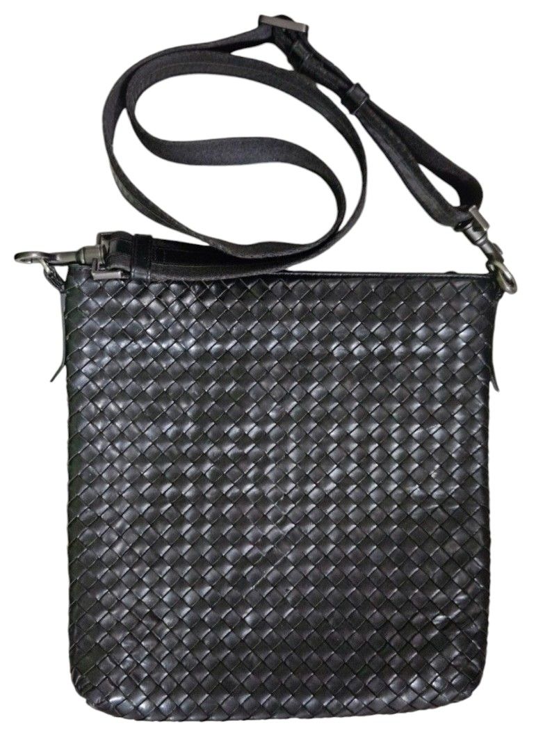 Bottega Veneta sling bag (Category: Luxury Bags & Wallets) located in Las Pinas. Submitted by 05.11minimalist (Listing ID 1320887463, Image 2). Description: Bottega Veneta Intrecciato sling crossbody bag. Black. Made in Italy. Dimensions: 11" x 11". Signed hardware. No missing tags. Zipper opens and closes smoothly. Sling, no cracks leather accent. Clean interior, no foul odor. No rips, runs or holes interior and exterior of bag. Very small rub o