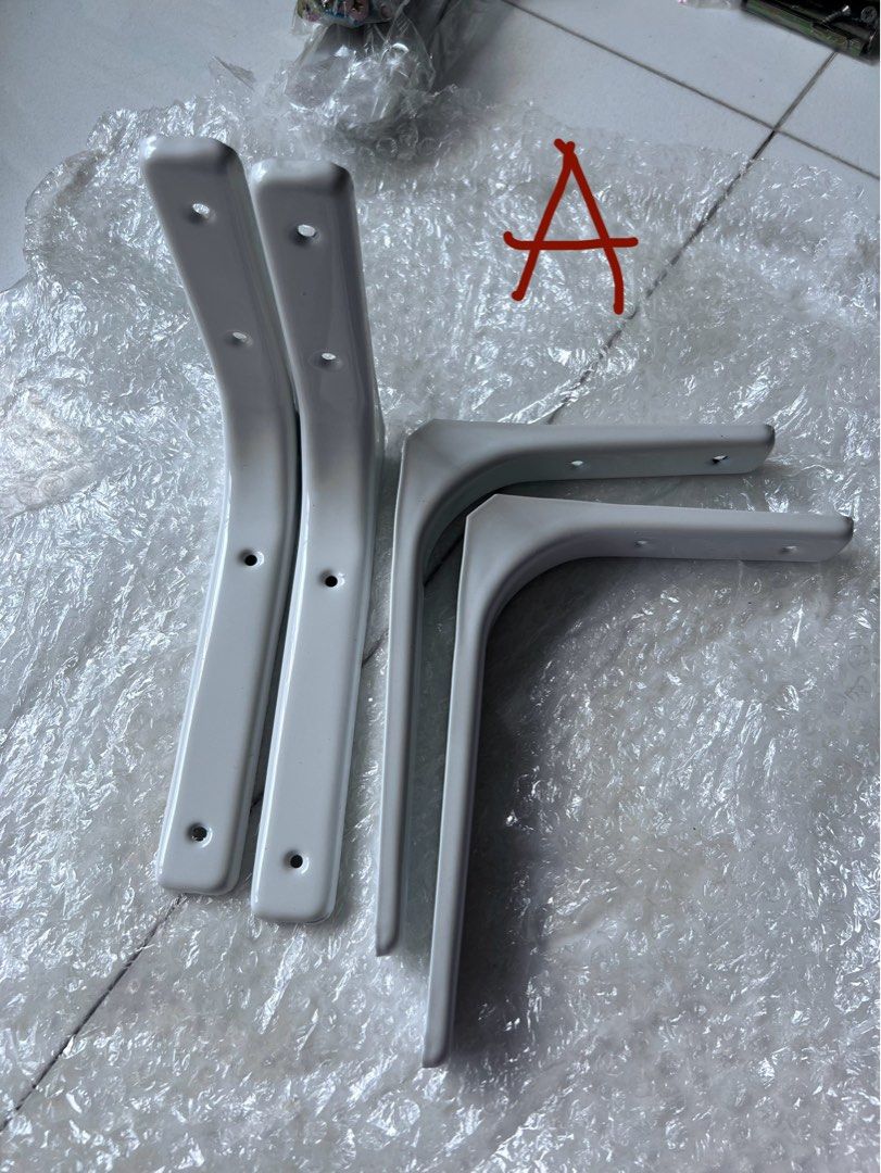 Bracket (Category: Home Improvement Tools & Accessories) located in Singapore. Submitted by sallyt126 (Listing ID 1326969291, Image 1). Description: All new Item A: $6 for 2 pairs Item B: $6 for 1 pair .