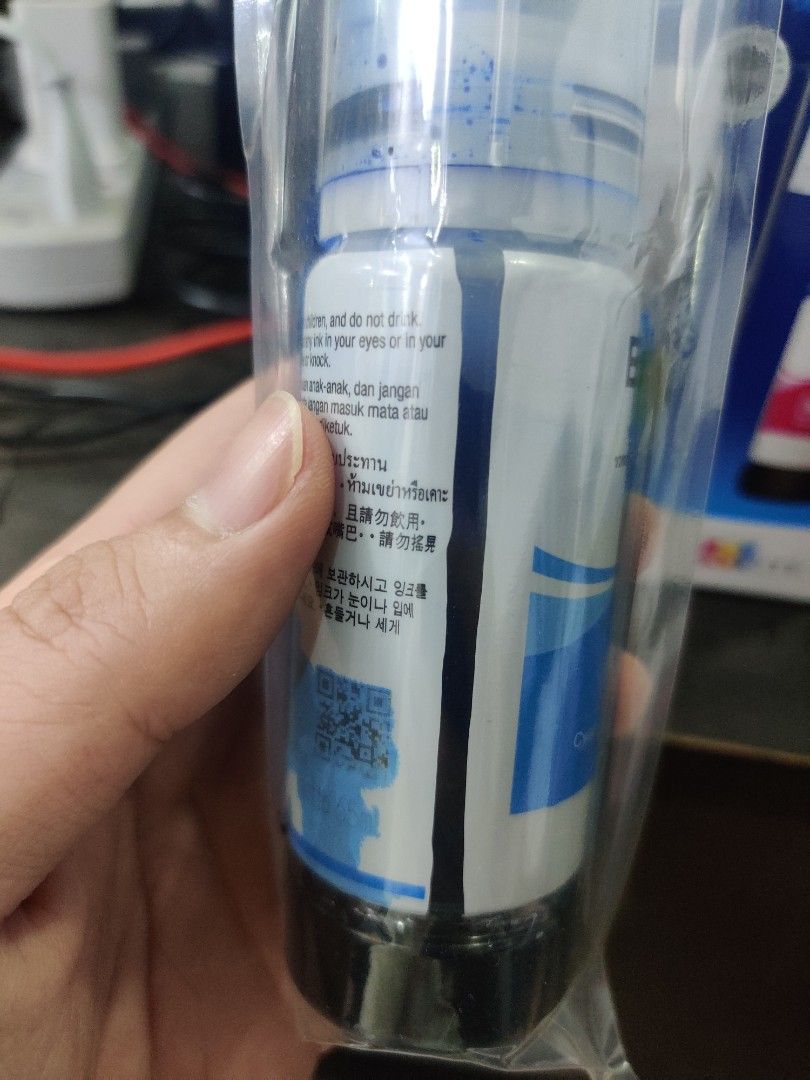 Epson Printer Ink (Category: Printers, Scanners & Copiers) located in Singapore. Submitted by hwangshoppe (Listing ID 1326864721, Image 2). Description: Epson 003 ink. 3 colours. brand new from popular. Blue ink spilled a little but still full..