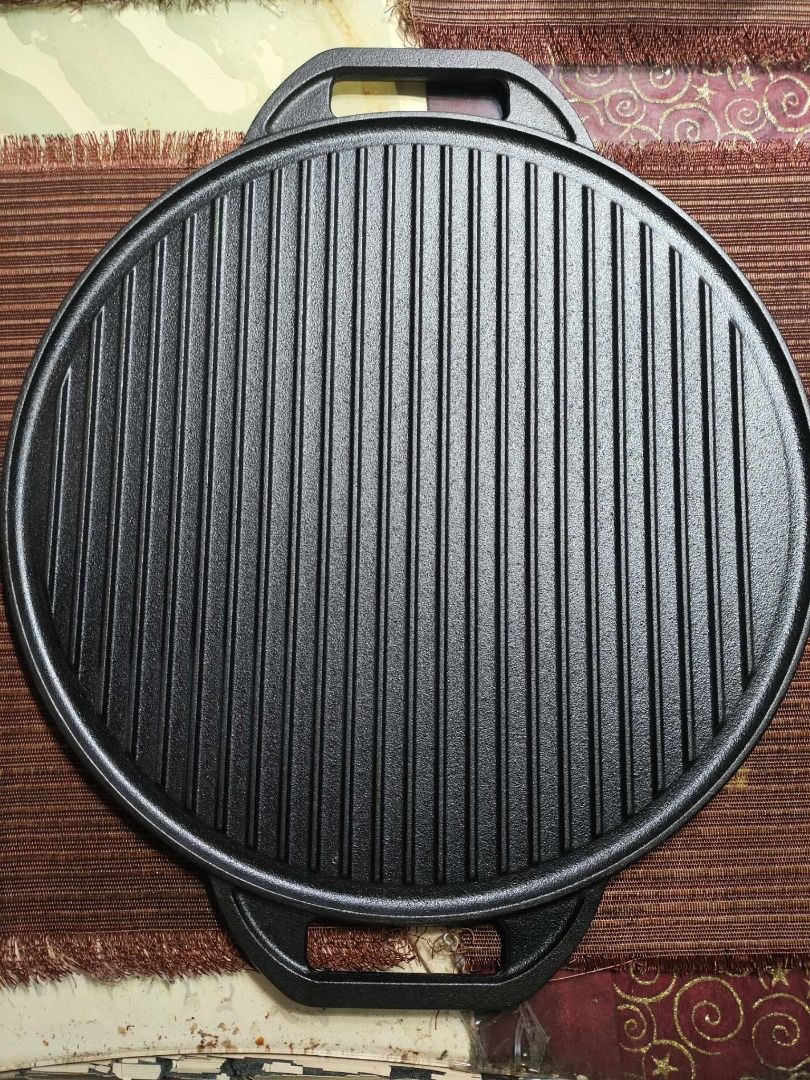 Fujida ROUND Reversible Grill/Griddle - ORIGINAL Cast Iron (Category: Cookware & Accessories) located in Manila. Submitted by bobbyyucommercial (Listing ID 1327024402, Image 2). Description: Fujida ROUND Reversible Grill/Griddle - ORIGINAL Cast Iron This double-burner Reversible Grill/Griddle functions as a dual cooking surface with both a smooth griddle and a ribbed grill. Fits over two stovetop burners, set both burners to the same temperature 