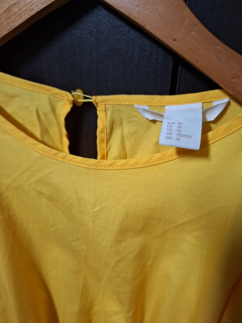 H&M Yellow Dress (Category: Dresses) located in Quezon City. Submitted by js.ms (Listing ID 1326992241, Image 3). Description: H&M Cold Shoulder Yellow Dress Size US 10 Fits Large to XL Garterized waist, with pockets Cool feel on skin Brandnew, store tag removed washed only. Never been used. Impulse buys for summer or beach wear RFS: decluttering Payment thru GCash, SF shouldered by buyer.