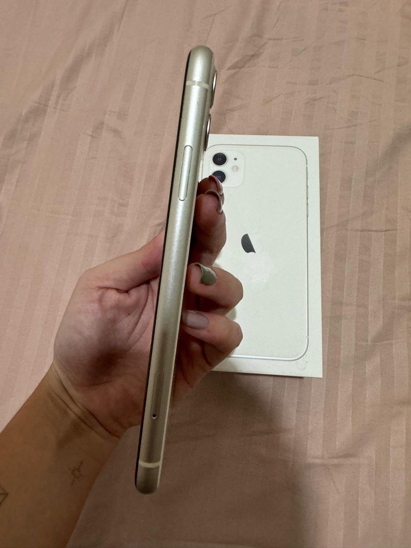 Iphone 11 128gb with Free Accessories (Category: iPhone 11 Series) located in Cebu City. Submitted by gerikaquintos (Listing ID 1326849993, Image 2). Description: Battery health 77% With some scratches on the screen (see photos) Rfs: Upgrade Inclusions: Charger head (not apple brand) 2 wires (one long and one short— not apple brand) 2 free case (check my other listing) All buttons and features still working perfect condition .