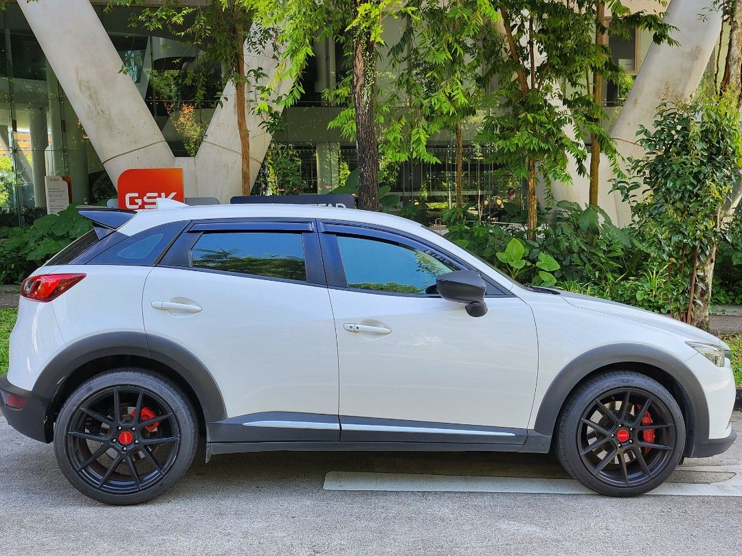 Mazda CX-3 2.0 Deluxe (A) (Category: Used Cars) located in Singapore. Submitted by hmbb123 (Listing ID 1326857336, Image 1). Description: Dealers will be ignored. Only dealing with direct buyer. - 1st Owner - Carefully maintained - Original sunroof - Newly changed Goodyear F1A6 19inch tyres - Nashin Big Brake Kit - 19 Rims - Matching red rear brake callipers - Real carbon fibre steering - Ultra racing front strut and arb - paddle gear shifter - A