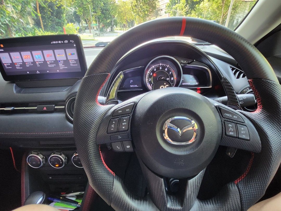 Mazda CX-3 2.0 Deluxe (A) (Category: Used Cars) located in Singapore. Submitted by hmbb123 (Listing ID 1326857336, Image 2). Description: Dealers will be ignored. Only dealing with direct buyer. - 1st Owner - Carefully maintained - Original sunroof - Newly changed Goodyear F1A6 19inch tyres - Nashin Big Brake Kit - 19 Rims - Matching red rear brake callipers - Real carbon fibre steering - Ultra racing front strut and arb - paddle gear shifter - A